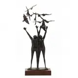 Standing Figures with Birds by Hugo Daini, Patinated cast bronze, sold May 2022