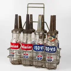 Untitled by Standard, oil glass oil bottles in metal carrier, offered May 2025