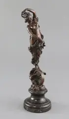 Standing upon a winged wheel and clouds by Paul Aichele, bronze, sold Jul 2018