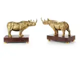 Untitled by Paar Rhinozerosfiguren in vergoldeter, bronze, sold Sep 2019