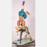 Acrobats and Dog by Gregory Gorby, 1991, Mixed media painted carved wood and fiber, offered Dec 2023