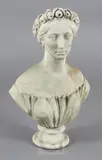 A carved white marble bust of a young lady wearing a rose garland in hair by Shakspere Wood, Wood, sold Nov 2017