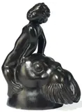 Enfant assis sur une tête de morse by Just Andersen, Bronze à patine vert-brun, sold Oct 2011