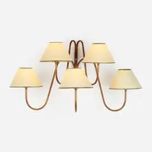 Five-Light Bouquet sconce by Jean Royere, c. 1948, enameled and gilt iron, paper, sold Jun 2022
