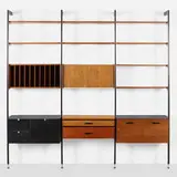 CSS (Comprehensive Shelving System) by George Nelson & Associates, 1959, enameled aluminum, walnut, laminate, aluminum, lacquered masonite, sold Jun 2022