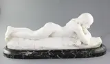 A white marble carving of a nude woman reclining reading a book by Charles R. Faggioni, sculpture, sold Jun 2017