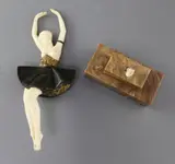 An Art Deco bronze and ivory figure of a semi-nude dancer, on stepped marble plinth, height overall 11.25in., ivory broken at the base by Pierre le Faguays, bronze and ivory, sold Jun 2017