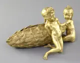 An early 20th century gilt bronze group of two children beside a large basket by Raoul Larche, bronze, sold Jun 2017