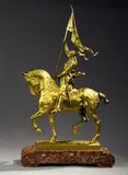 Jeanne d'Arc équestre by Emmanuel Frémiet, 1874, Bronze à patine dorée sur un socle en marbre rouge veiné de blanc, sold Apr 2009