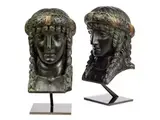 Untitled by Paar geschnitzte Frauenköpfe, bronze, offered Sep 2019