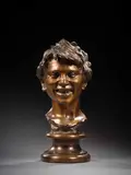 Tête de jeune napolitain riant by Vincenzo Gemito, Bronze à patine médaille richement nuancé, sold Feb 2026