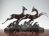 An Art Deco bronze group of two running gazelles by Lucien Charles Alliot, bronze, sold Mar 2016