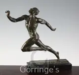 An Art Deco bronze figure of a running athlete by Pierre Le Faguay, bronze, sold Mar 2016