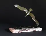 Albatros au-dessus des flots by Georges Raoul Garreau, Bronze à patine verte, sold Oct 2021