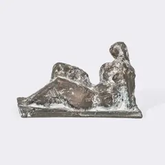 Kleine Liegende by Werner Stötzer, 1996, Bronze, mit weißen Anhaftungen, sold Jun 2026