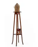 Gustave by Eva Jospin, 2011, Urne en carton découpé, photographie en couleur d'un Gustave reposant sur un socle en bois, sold Jun 2026