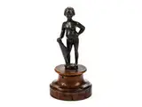 Untitled by Kleine Bronzestatuette eines wappenhaltenden Knaben, bronze, sold Sep 2017