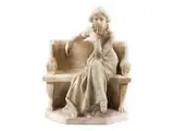 Untitled by Marmorskulptur Junge Frau auf Bank, marble, sold Sep 2017