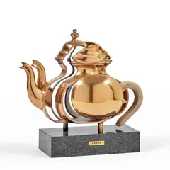 Tea for two by Arman, 1985, Théière en bronze découpé avec poignée en bois sur socle en marbre, sold Apr 2026