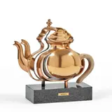Tea for two by Arman, 1985, Théière en bronze découpé avec poignée en bois sur socle en marbre, sold Apr 2026