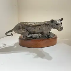 Untitled by Melvin Johansen, bronze lioness. Signed on base, offered Feb 2023