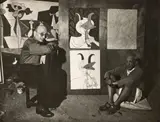 Pablo Picasso et Jaime Sabartes devant La Joie de vivre et des oeuvres représentant Sabartes en faune by dit Michel Sima Michal Smajewski, Épreuve argentique d'époque, sold Jun 2025
