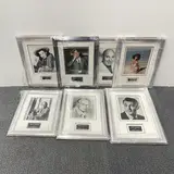 Yul Brynner, Telly Savalas, Elizabeth Taylor by Norman Wisdom, Autograph interest: A group of framed autograph photographs of Robert Mitcham, sold Jul 2023
