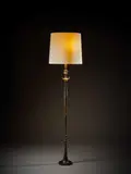 Lampadaire modèle "Figure by Alberto Giacometti, circa 1933-1934, Bronze à patine brun vert nuancé, sold Jun 2025