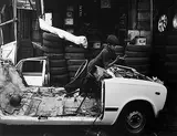Boy in white car, Chimna Butcher Lane by Ketaki Sheth, Silver gelatin print on archival paper, sold Jul 2012