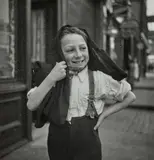 Enfant aux bretelles, c. 1935 by dite Dora Maar Henriette Theodora Markovitch, Épreuve argentique d'époque, tirée par contact, contrecollée sur une pochette en papier cristal,, sold Dec 2024