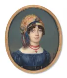 Portrait de femme coiffée d’un turban multicolore et collier de corail avec une croix en pendentif by Pierre-Edouard Dagoty, Aquarelle et gomme arabique sur ivoire, de forme ovale, sold Nov 2024