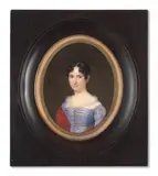 Portraits d’un couple, l’homme en habit noir, la femme en robe lavande et cachemire rouge by Zéphirin Belliard, Paire de miniatures, aquarelle et gomme arabique sur ivoire, de forme ovale, sold Nov 2024