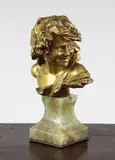 A 19th century French gilt bronze bust, modelled as a young lady with vine wreath in her hair, on an onyx socle base by Antonin Larroux, bronze, sold Dec 2015