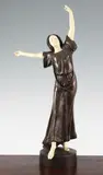 A patinated bronze and ivory figure of a young lady dancing, on circular base by Peter Tereszczuk, bronze and ivory, sold Dec 2015