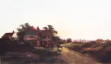 Figures and horses by an inn at sunset by Walter Williams, oil on canvas, sold Apr 2015