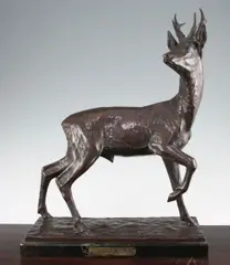 On rectangular marble by Fritz Diller, bronze, sold Apr 2015