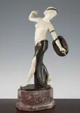 An Art Deco alabaster and patinated bronze model of a scantily clad female, holding a shield, with oval base, on an octagonal marble plinth, 16.75in., restored by George Schrimpf, bronze, sold Feb 2015