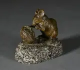 Souris grignotant une noix by Clovis-Edmond Masson, Bronze à patine brune nuancée et socle en granit, sold Jun 2021