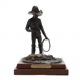 Tired Of Playing Around by Bud Helbig, Patinated bronze, sold Dec 2020