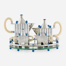 Piazza tea and coffee service with tray by Michael Graves, 1980 / 1991, sterling silver, glass, plastic, enameled aluminum, sold Mar 2022