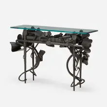 Sideboard by Albert Paley, 1991, forged and fabricated steel with a blackened finish, glass, sold Apr 2024