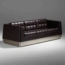 Sofa from Qantas First Class Lounge, Melbourne Airport by Marc Newson, 2007, leather, stainless steel, sold Mar 2022