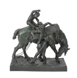 of three boys mounting a horse by Arthur Jacques Leduc, patinated bronze, sold Jan 2013