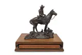 Taking Stock by G. Harvey, 1986, bronze, sold Nov 2024