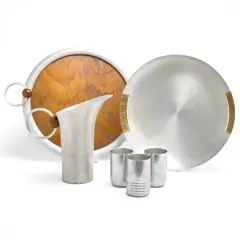 Spun Aluminum Tableware, Group of 6 by Russel Wright, aluminum, wood, sold Mar 2025