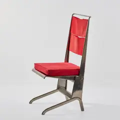 Klappstuhl by Jean Prouvé, 1924, Metallblech, Metallrohr, vernickelt, Schichtholz, schwarz lackiert, Textilstoff, rot (Tecta, Lauenförde, 1980er Jahre), sold Oct 2026