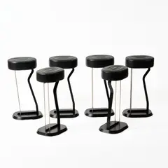 Sechs Barhocker 'Bar Stool No. 2' by Eileen Gray, 1928, Gussstahl, Profilstahl, geschwärzt, Edelstahlstab, schwarzes Leder (Classicon, München), sold Oct 2026
