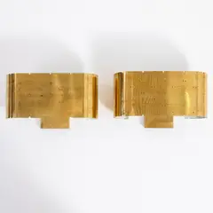 Zwei Wandleuchten '9460' by Paavo Tynell, 1940, Messingblech, perforiert, teilweise weiß lackiert (Idman Oy, Helsinki), sold Oct 2026