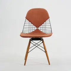 Stuhl 'PKW-2' mit Bikini-Polsterung by Charles and Ray Eames, 1952, Metalldraht, Metallstäbe, schwarz lackiert, Hopsack, rostrot, Buchenholz (Seng, Chicago; Herman Miller, Zeeland), offered Oct 2026