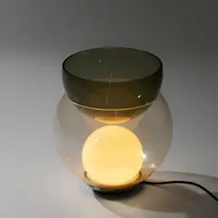 Tischleuchte mit Vase 'Giova' by Gae Aulenti, 1964, Glas, farblos und rauchfarben (Poltronova Montale, Pistoia), offered Oct 2026